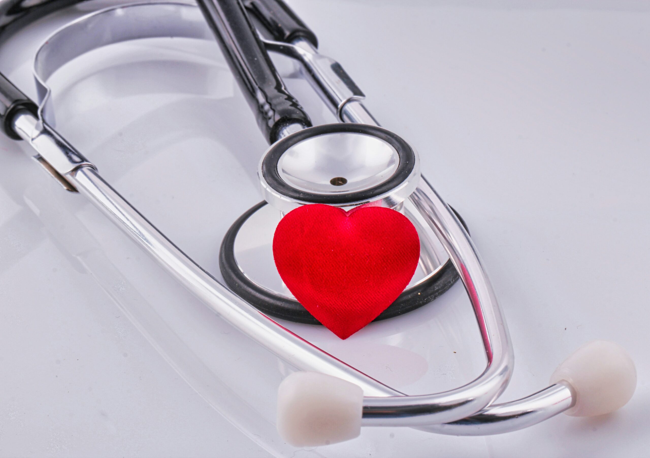 Heart and stethoscope representing cardiovascular health and heart risk in active adults